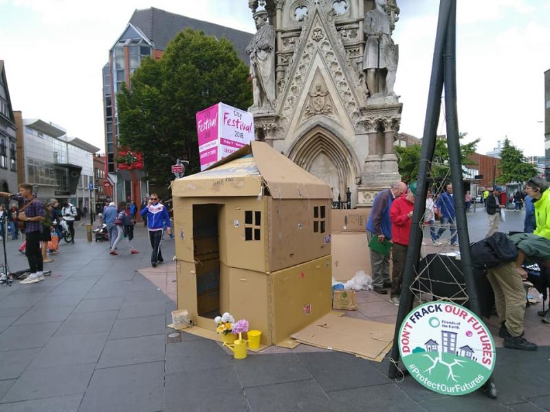 Leicester Friends of the Earth in street with cardboard shed protest against permitted developments.