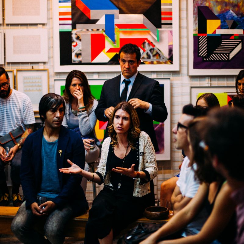Group of people discussing something in a meeting