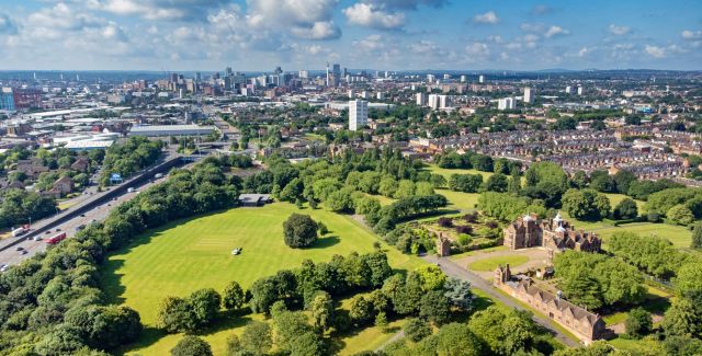 A park with trees and grass on the edge of Birmingham city centre