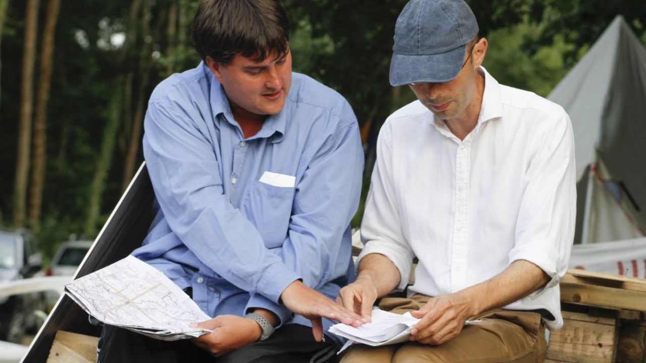 Friends of the Earth's environmental lawyer Jake White talks to local resident, Carl Lee, at a demonstration in Balcombe, West Sussex, against oil exploration by Cuadrilla, 7 August 2013.
