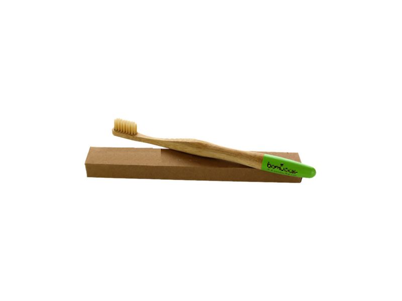 A bamboo toothbrush and box