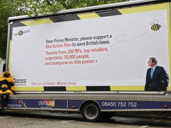 The Bee Cause billboard in Witney, Oxfordshire June 2013. .The billboard displays the names of 10,000 people who are calling on David Cameron to save British bees. Witney is David Cameron's constinuency.