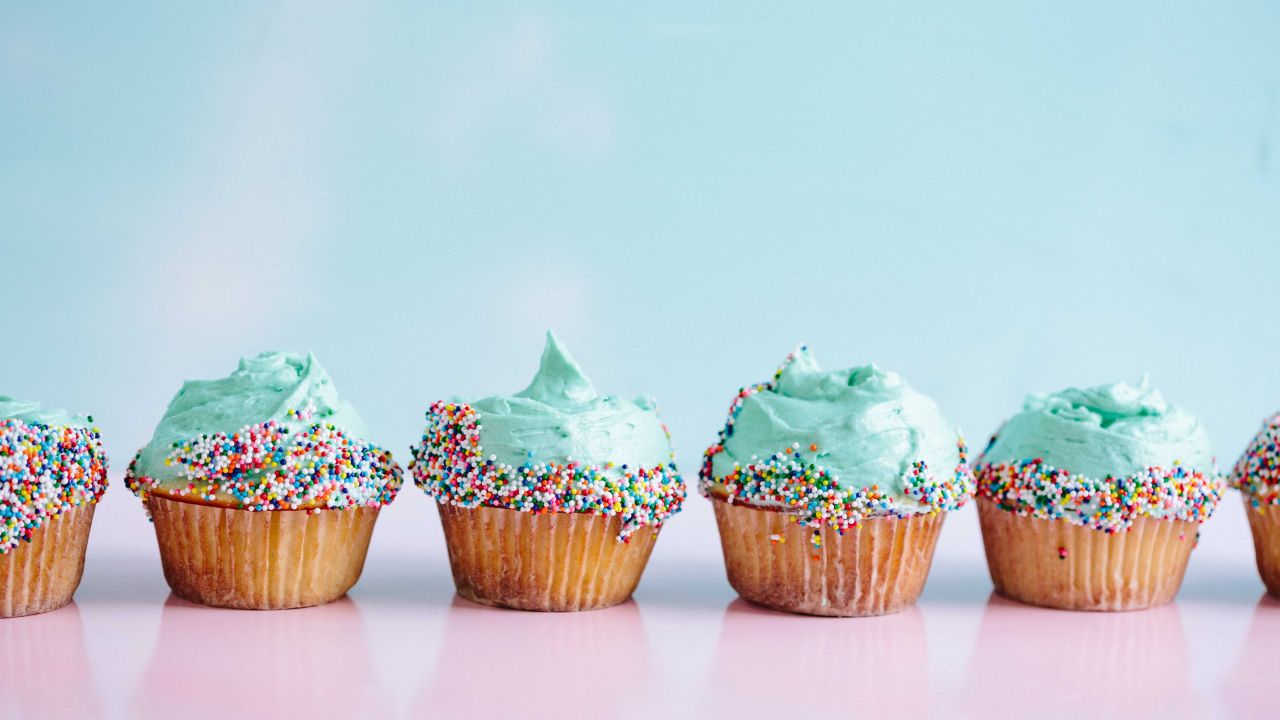 Teal cupcakes with sprinkles