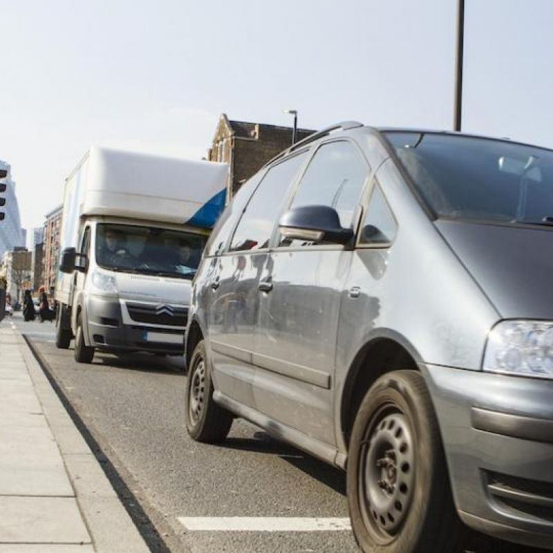Car and van stuck in traffic