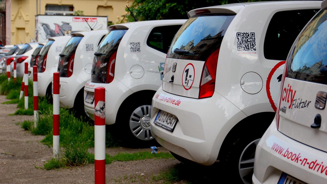 A line of white cars belonging to the City Flitzer car sharing scheme