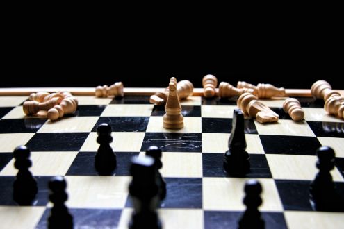 A chessboard with a game of chess underway