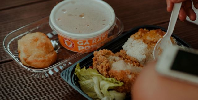 Chicken takeaway in plastic trays.