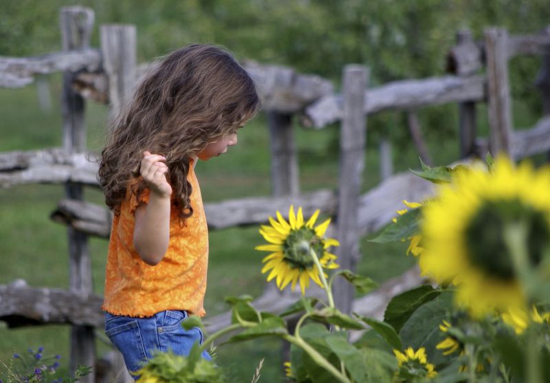 Girl and sunflowers