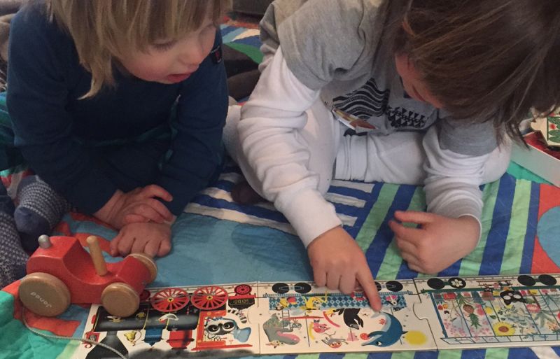 Children enjoying playing with plastic-free toys