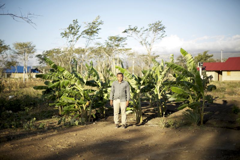 Jairo Fuentesepiayu, a Tamaquito community representative, stands outside on arable land in Colombia