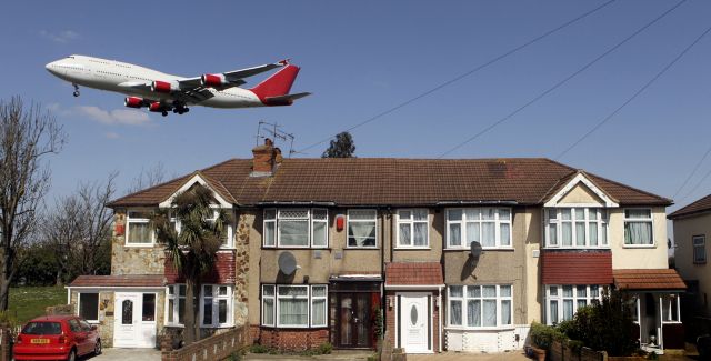 An aeroplane coming into land at Heathrow airport, London, UK