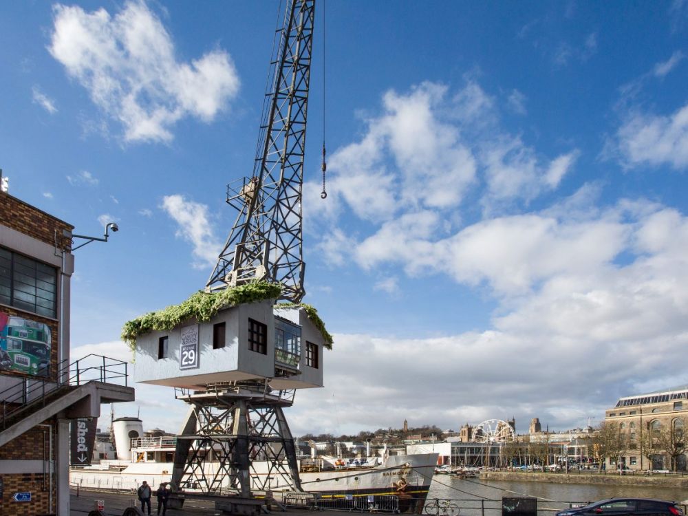 A treehouse in a crane over the docks in Bristol