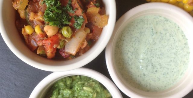 Vegetarian chilli with homemade guacamole, yoghurt and sweetcorn, in pots
