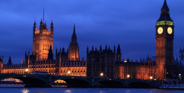 UK parliament at night, over the river Thames