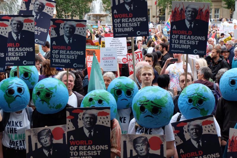 Earth heads from Friends of the Earth protest Trump's visit, 2019