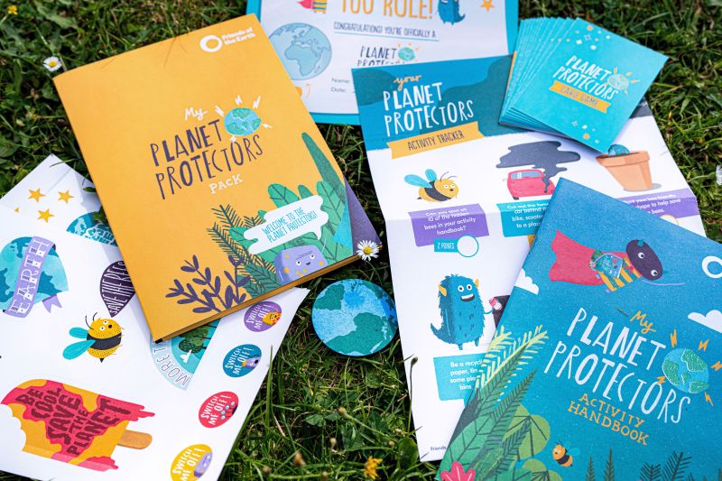 Picture of a planet protectors pack spread out on grass