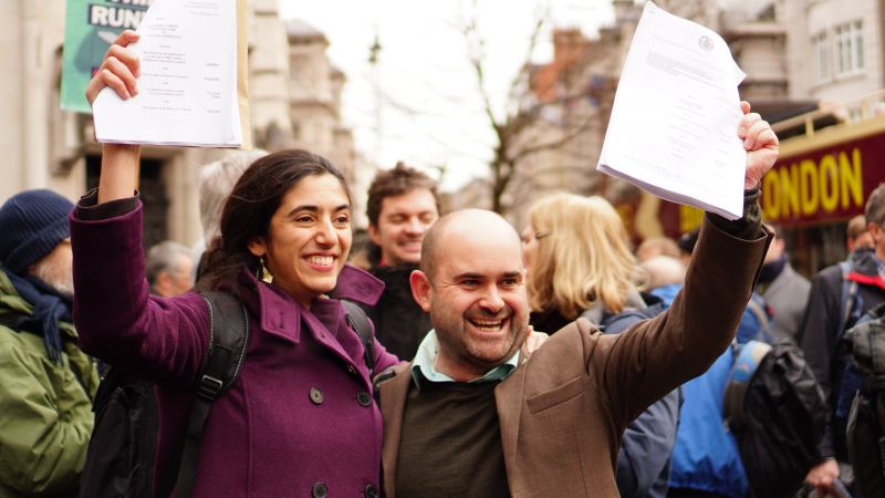 Our lawyers Katie and Will outside Court after Heathrow