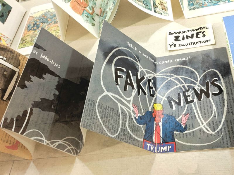 An environmental zine with an illustration of Trump in a gas mask, denying climate change