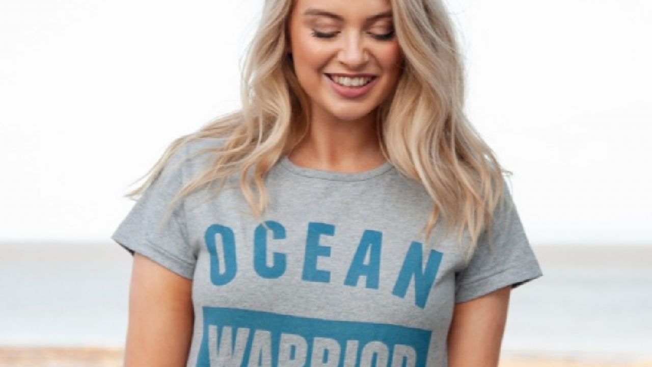 Female model wearing Ocean Warrior tshirt - Friends of the Earth / Teemill