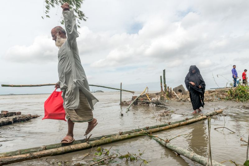 Heavy flooding from monsoon rain and tide from river in Dohar, Bangladesh