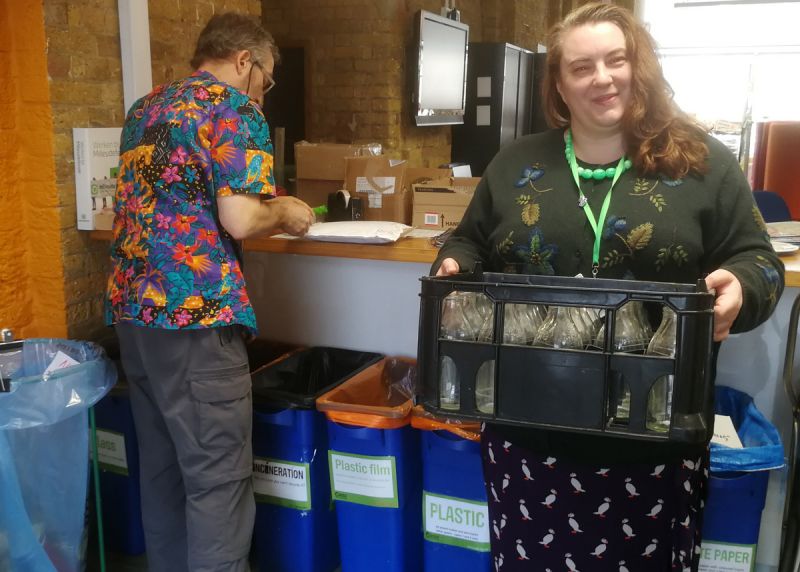 Multiple recycling bins, including glass milk bottle crate, Friends of the Earth London office