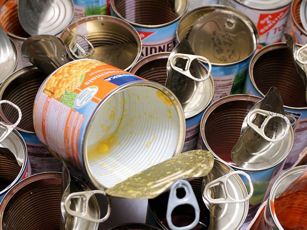 Empty food cans ready for landfill or recycling
