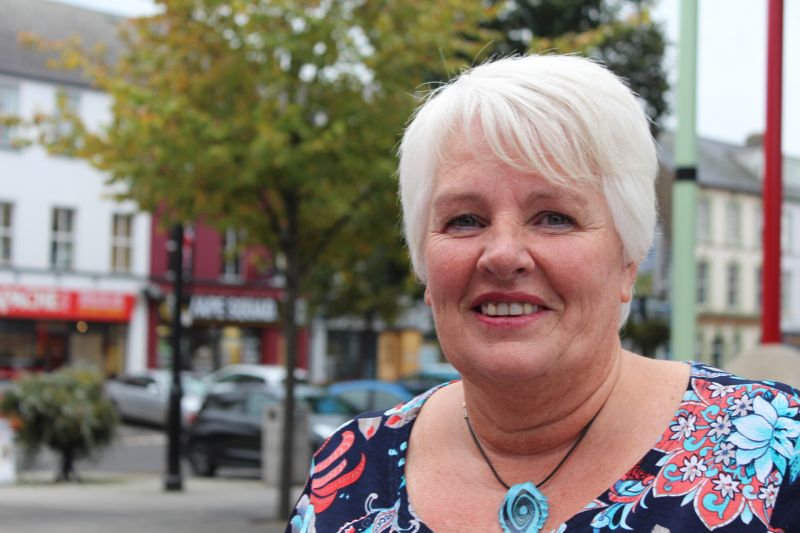 Gwyneth McQuiston from Stop Limavady Pig Factory in street facing camera. Portrait.