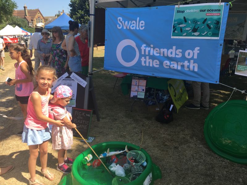 Children enjoy fishing plastic waste out of the 'sea'