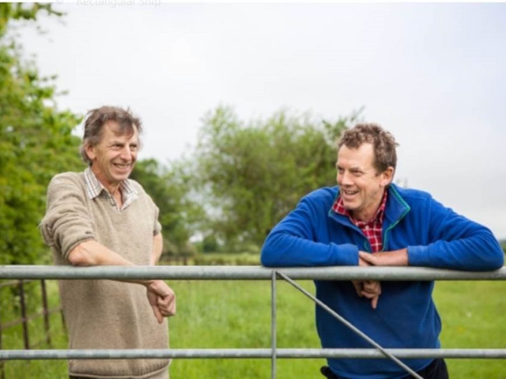 Farmers John & Paul Cherry at gate into field