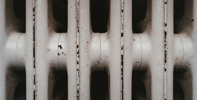 Close up image of a rusty space heater