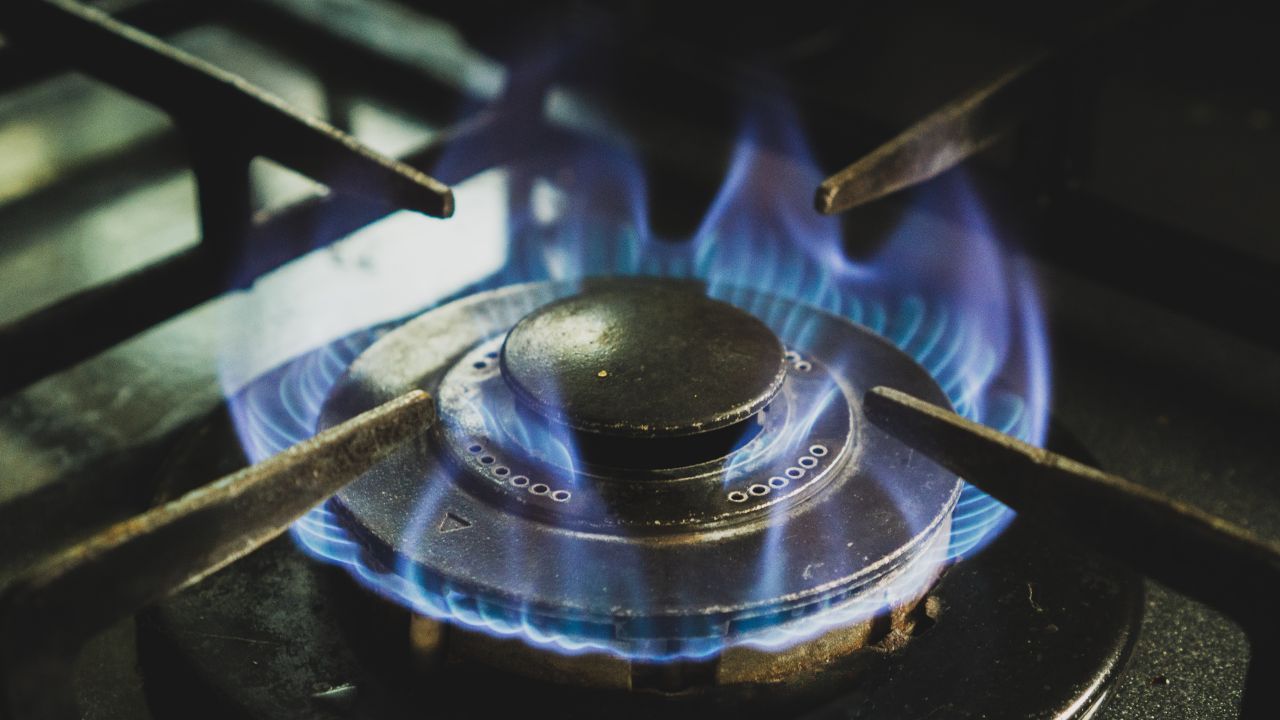 Close up photo of gas stove lit up
