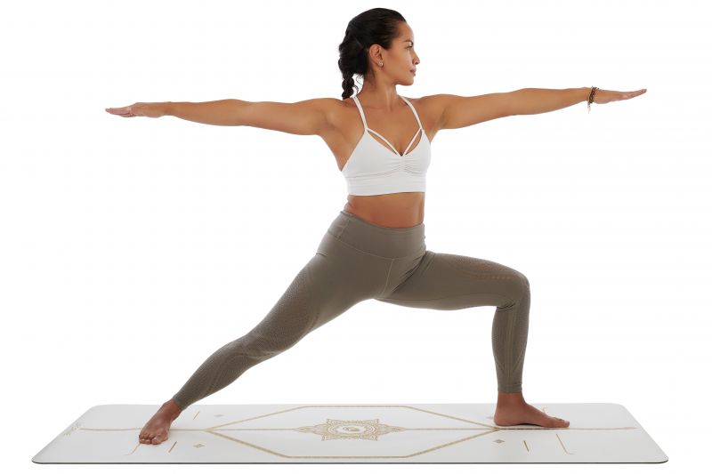 Woman using Liforme yoga mat