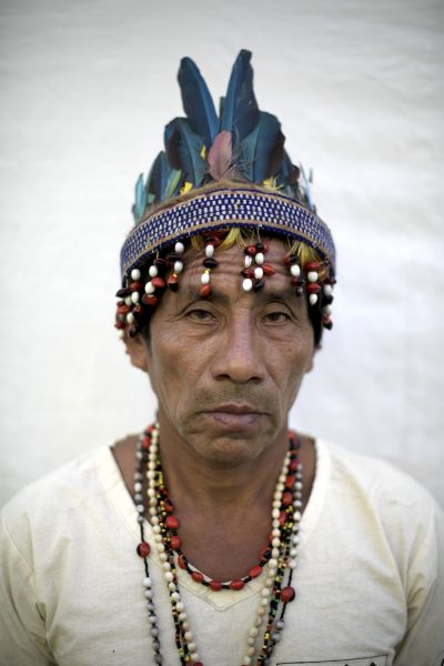 Peruvian campaigner Carlos Cenepo Pizango faces camera. Head and shoulders shot.