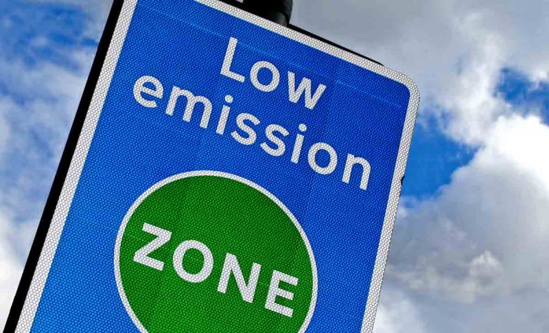 Blue and green Low Emission Zone road sign, London