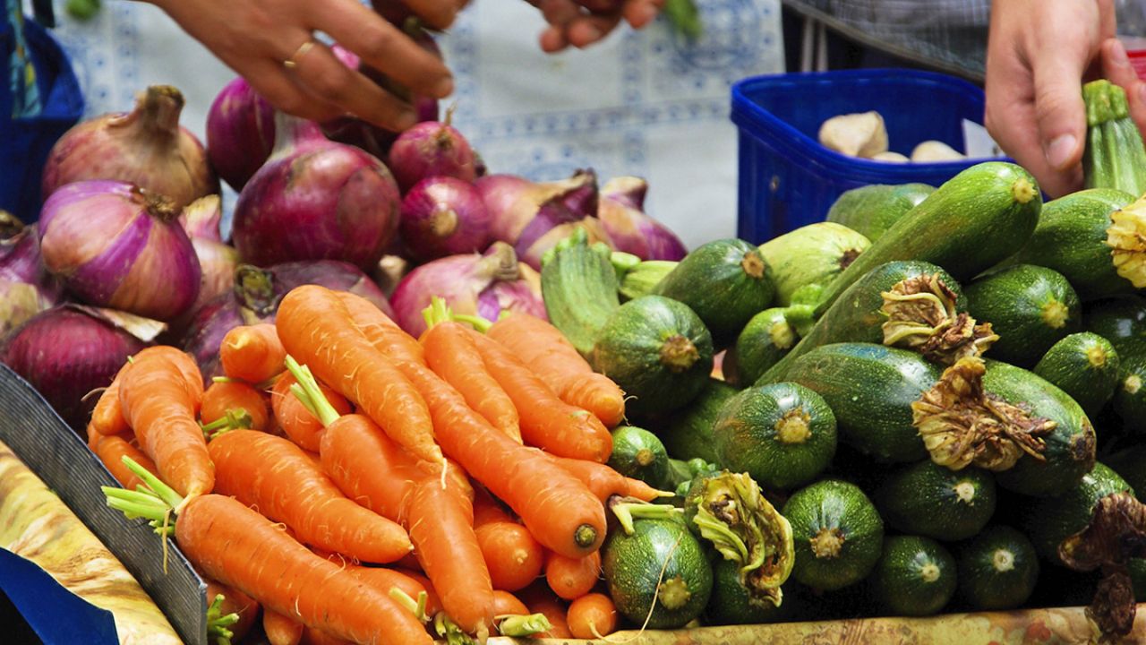 Carrots and courgettes in a fruit and vegetable market