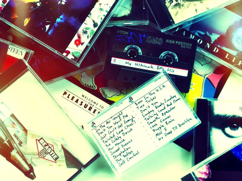 A mixtape on top of scattered CDs