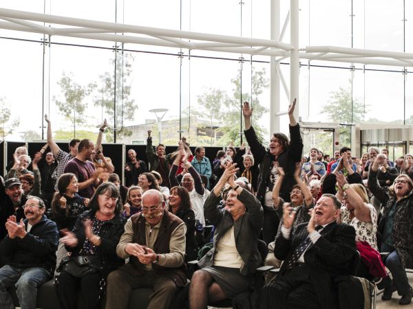 Local communities celebrate the council's unanimous decision to reject an application for a new opencast coal mine, in Nant Llesg, near Merthyr Tydfil in south Wales, Caerphilly County Council, 5 August 2015