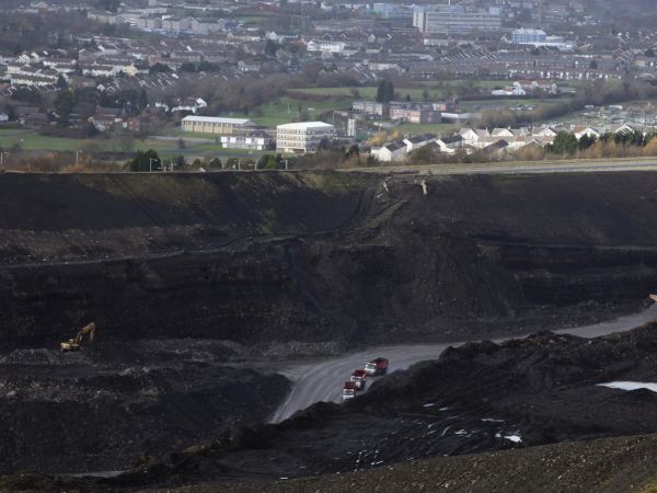 Quarry lorries move materials around the Ffos-Y-Fran opencast coal mine on November 17, 2009 in Merthyr Tydfil, Wales.