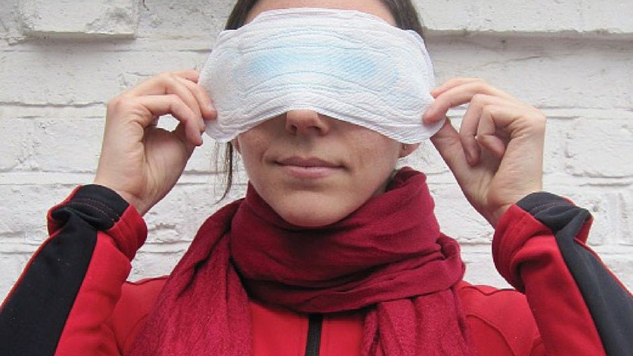 photo of woman holding sanitary pad