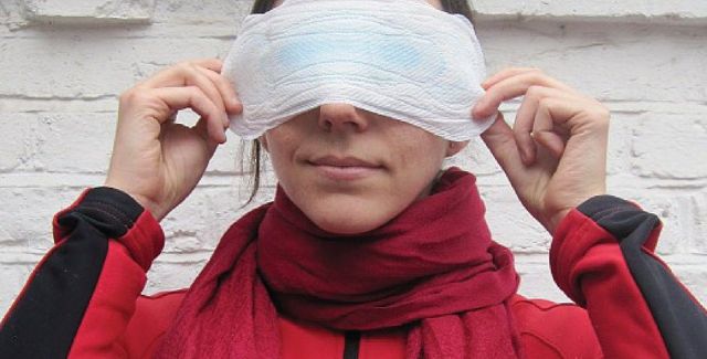 photo of woman holding sanitary pad