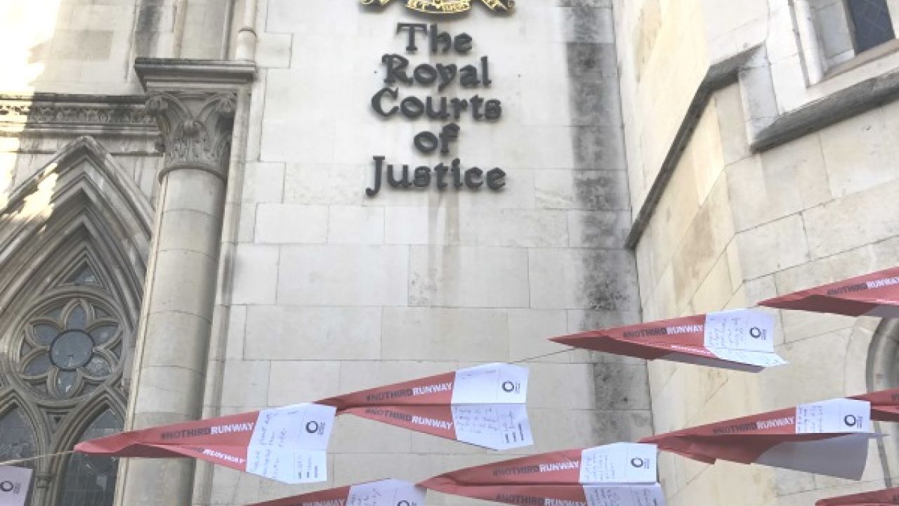 Paper planes with messages opposing a third runway at Heathrow outside the Royal Courts of Justice.