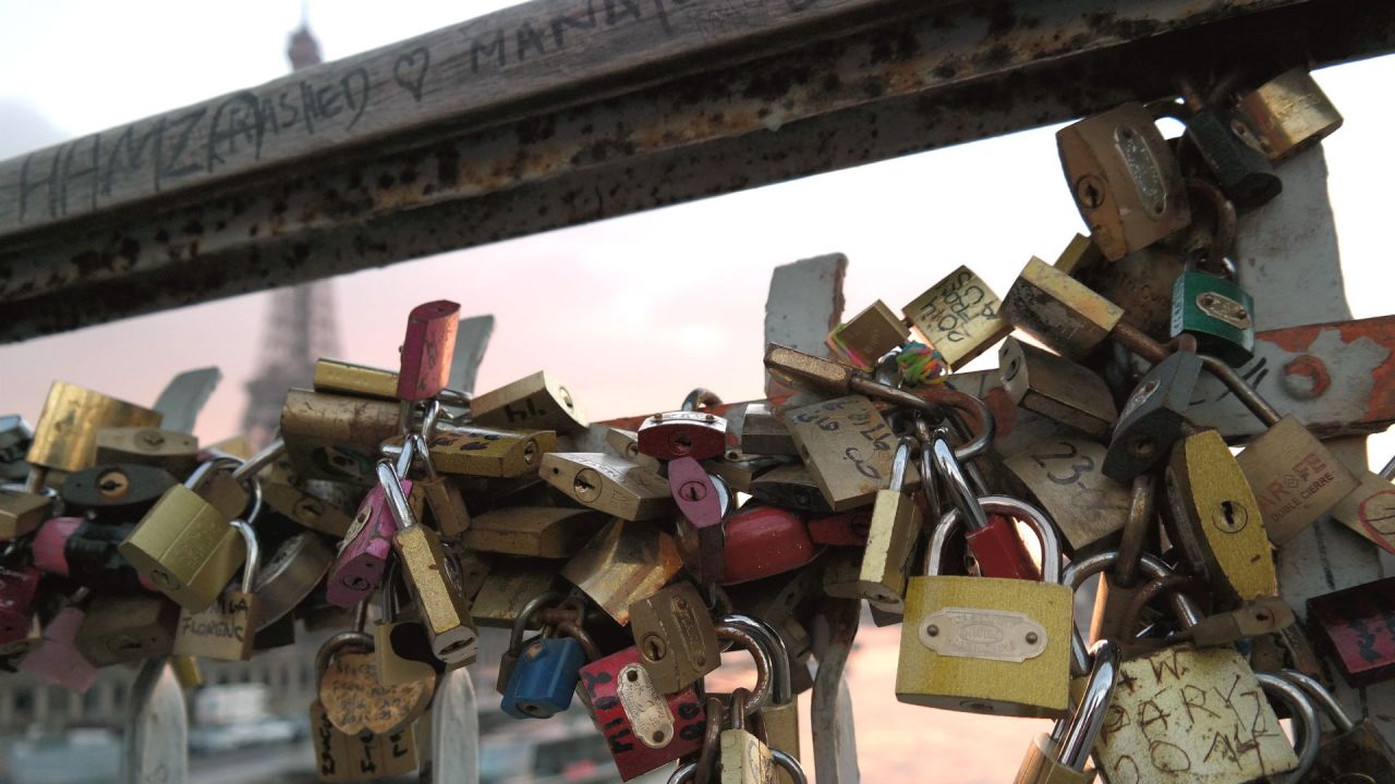 Padlocks symbolically fastened to one of the French capital's main bridges by loved-up couples