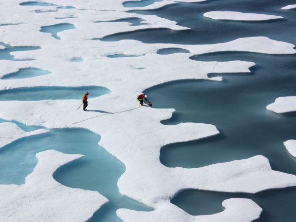 The sea ice atop the Arctic Ocean looking more like Swiss cheese or a bright coastal wetland. July 12, 2011