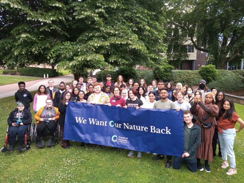 Group of students with banner saying We want our nature back
