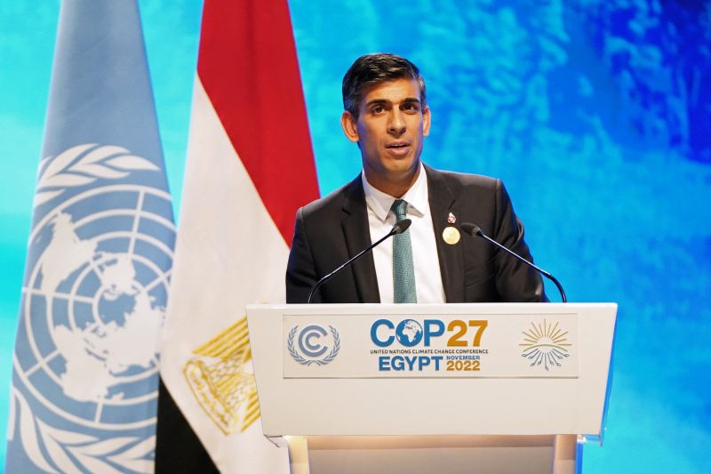 Rishi Sunak stands at a lectern giving a speech at COP27 climate talks in Egypy