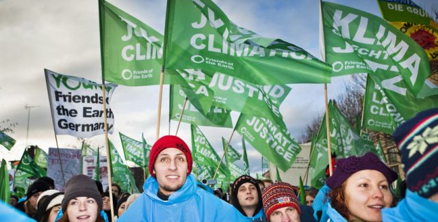 photo of Friends of the Earth campaigners at international climate talks