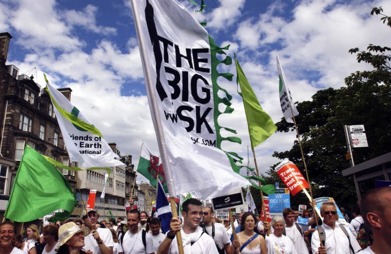 photo of peaceful march with Big Ask campaign banners