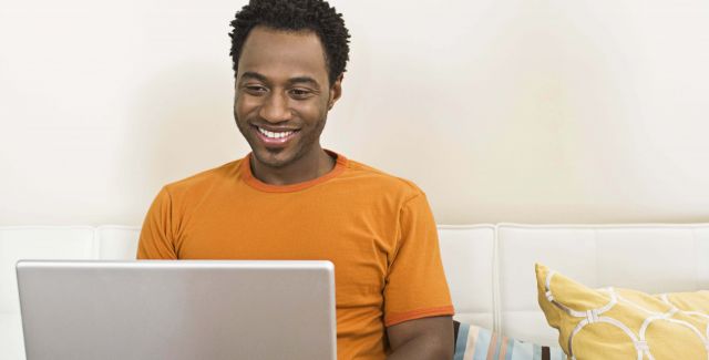 man working on a laptop computer