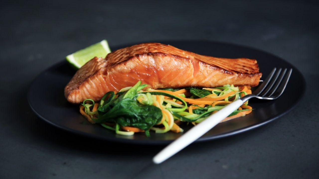 Salmon and vegetables on plate