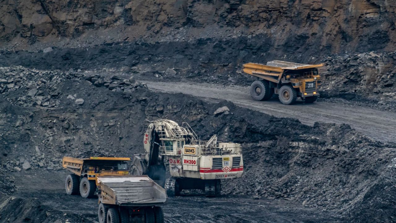 Diggers and other heavy vehicles at Shotton opencast coal mine in Northumberland